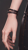 Detail of LYRIA's hand and bracelets.